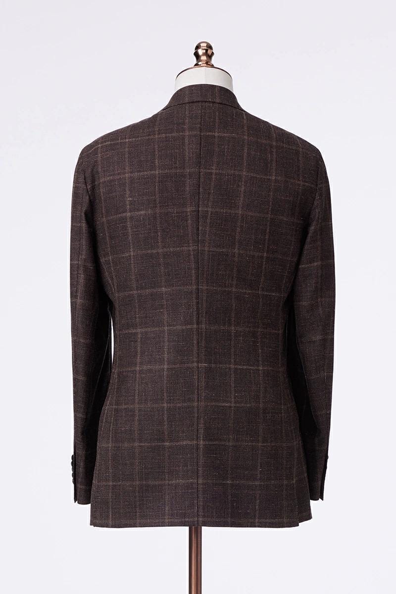 Brown checkered suit jacket on a mannequin against a white background